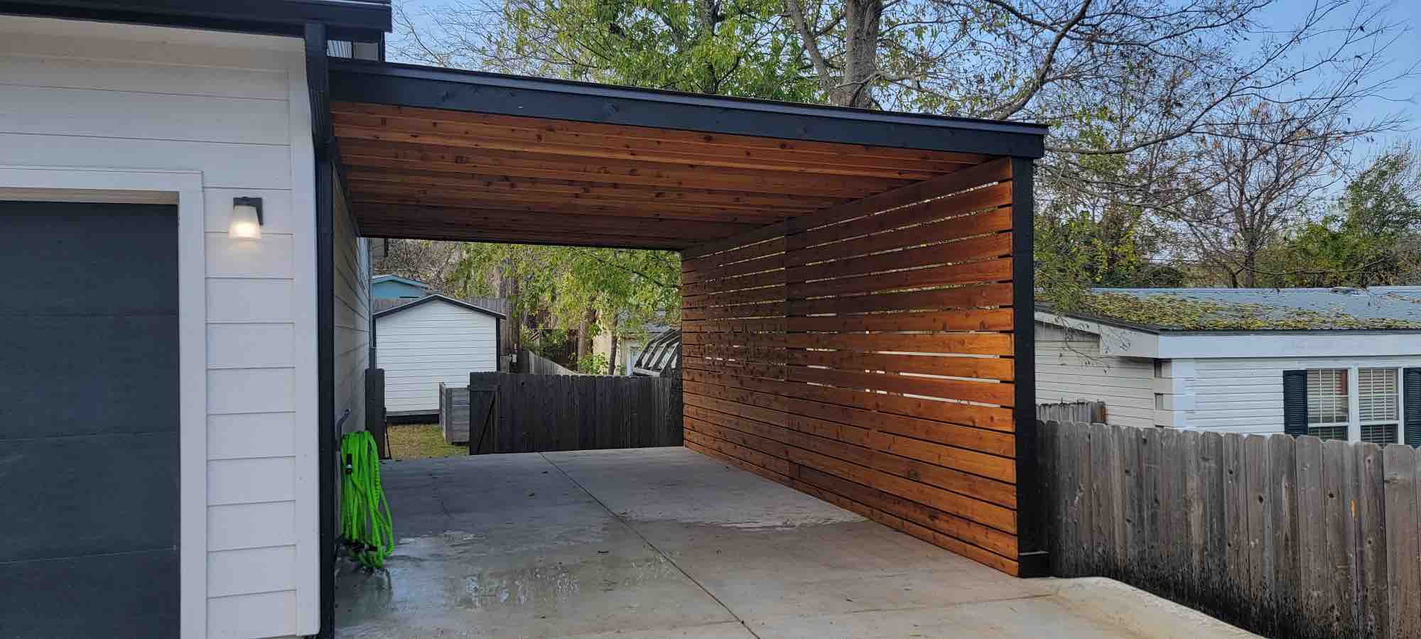 Carport with R Panel Metal Roof and Privacy Blind